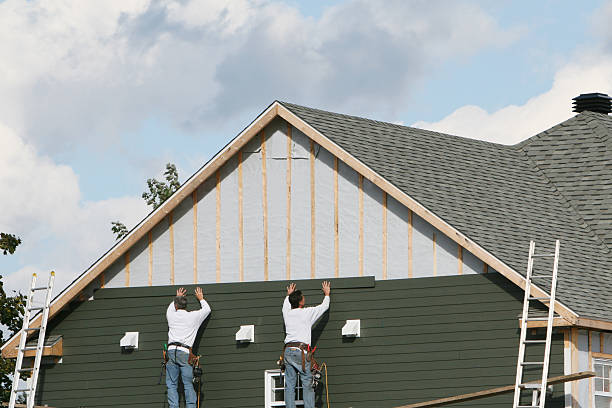 Professional Siding technician working in Carson, VA
